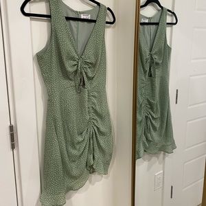 Sage green dress with ruching detail